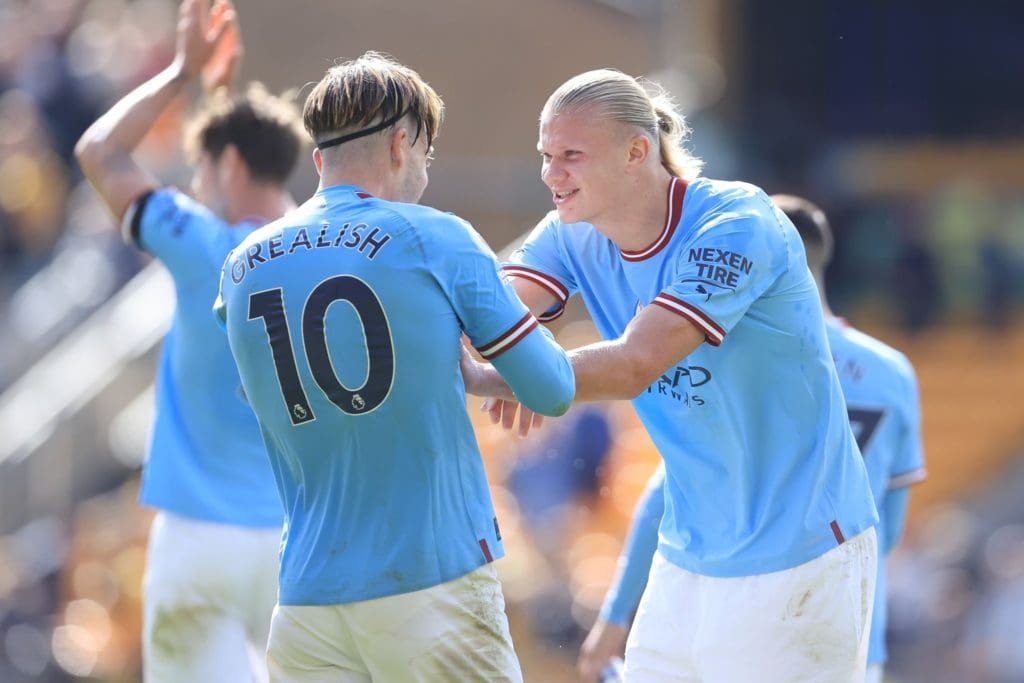 Erling Haaland y Jack Grealish