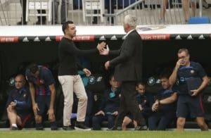 Xavi y Carlo Ancelotti