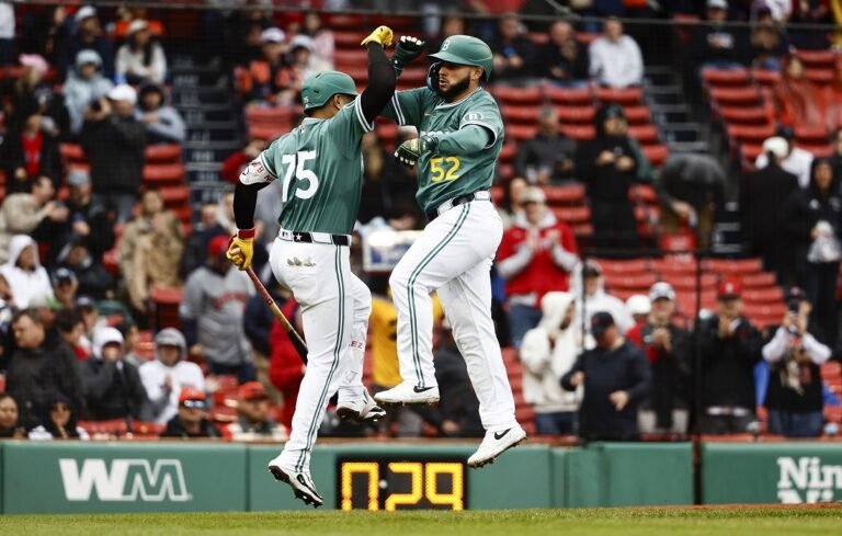 Wilyer Abreu y Abraham Toro